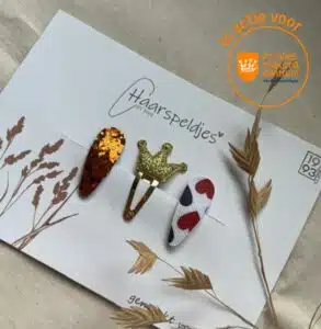 Drie klik klak haarspeldjes voor meisjes met vrolijke hollandse kleuren