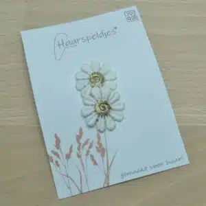Antislip haarspeldje Loes - madelief bloem met gouden kern Anti slip haarspeldje met wit gouden bloemetjes