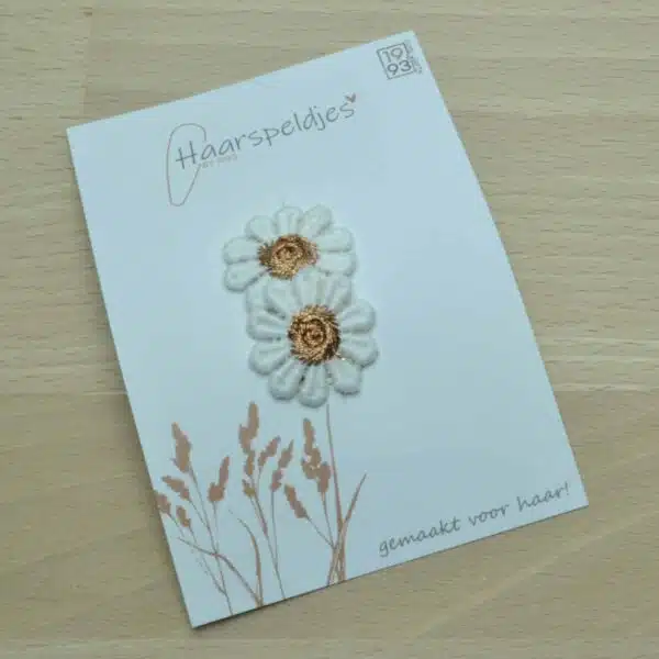 Haarspeldje antislip met twee witte bronzen bloemetjes
