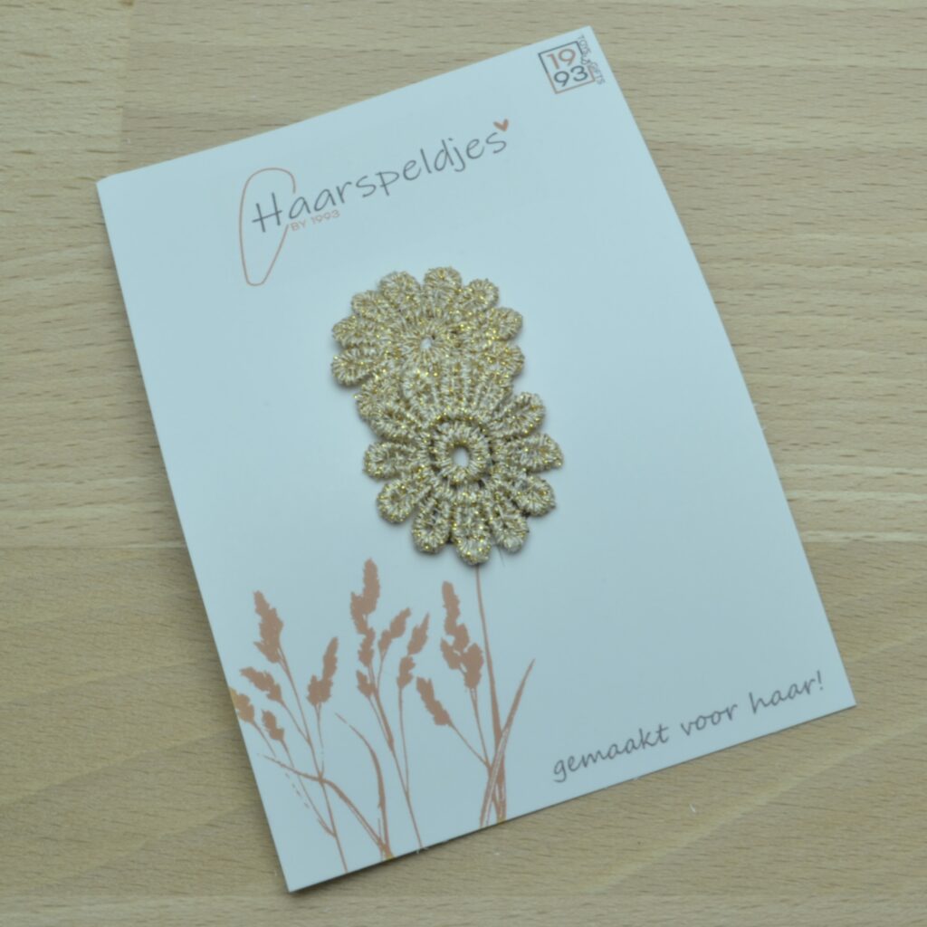 Antislip haarspeldje met goudkleurige bloemetjes