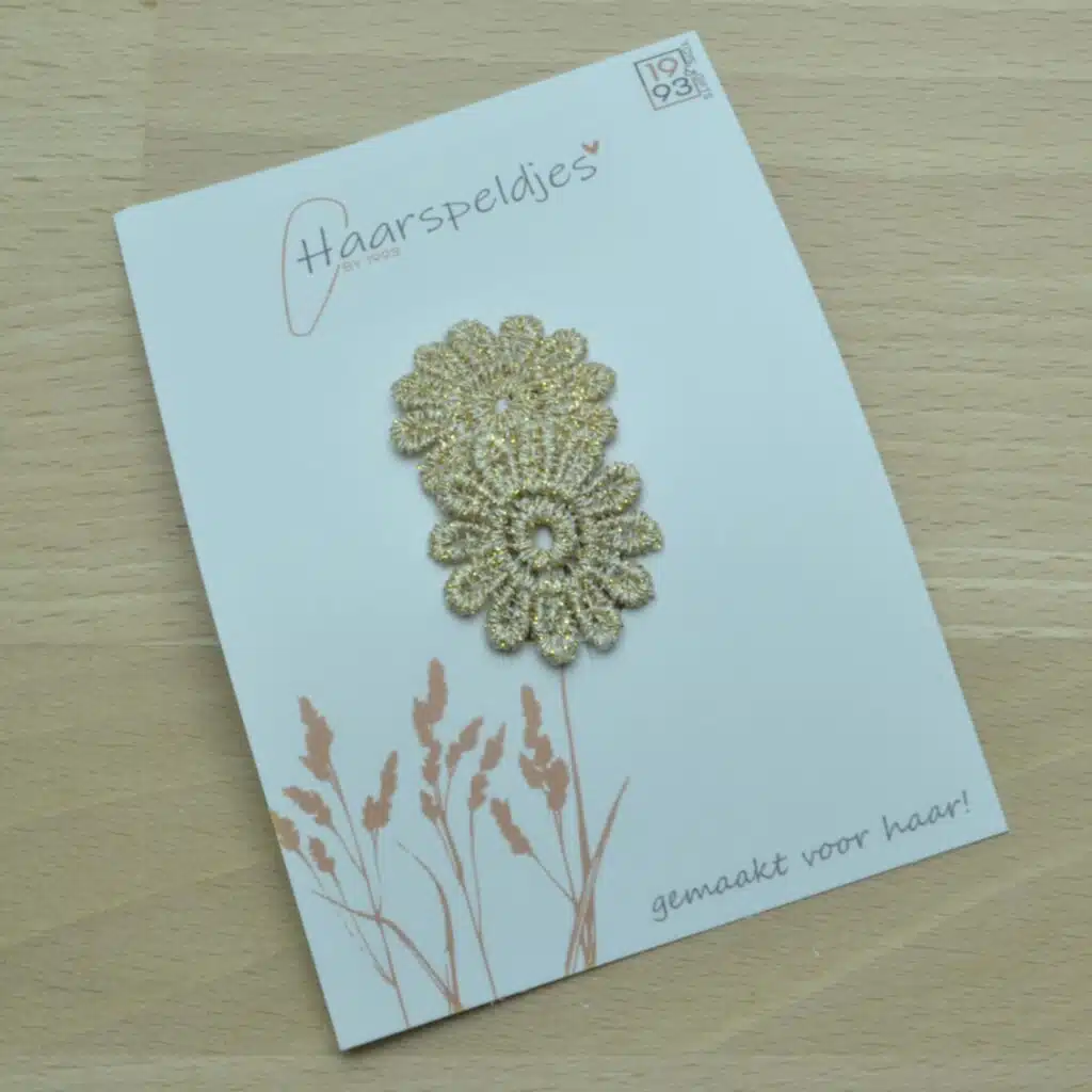 Antislip haarspeldje met goudkleurige bloemetjes
