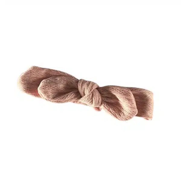 Stoffen roze haarbandje met werkje