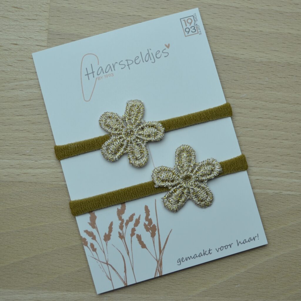2 leuke haarelastieken met gouden bloemen