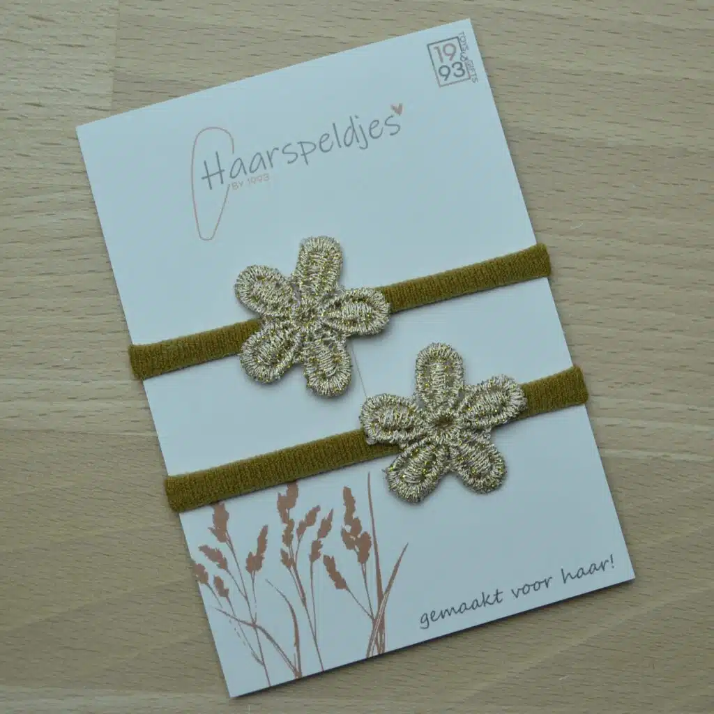 2 leuke haarelastieken met gouden bloemen